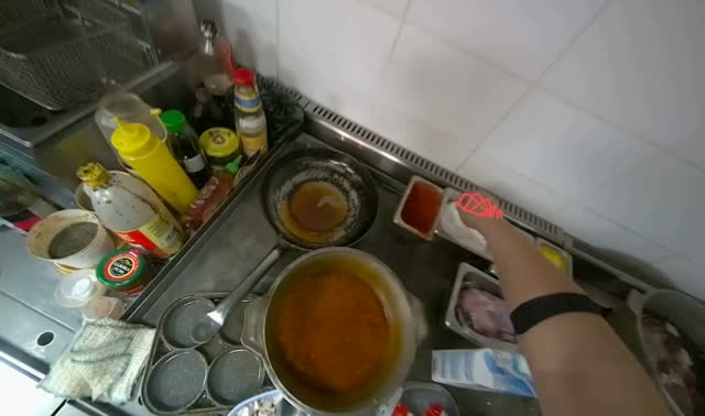 Adding ingredients to pot: egocentric robotics sample