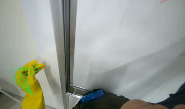 Cleaning white panel and frame: egocentric robotics sample