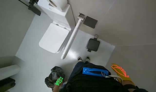 Collecting trash from toilet stalls: egocentric robotics sample