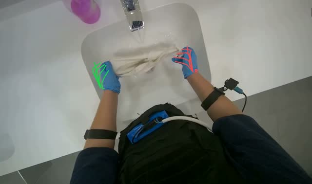 Rinsing cleaning cloth: egocentric robotics sample