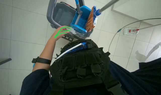 Preparing string mop for cleaning: egocentric robotics sample