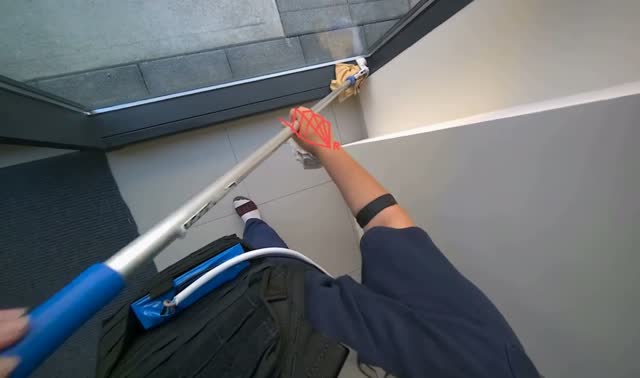 Cleaning windows with mop: egocentric robotics sample