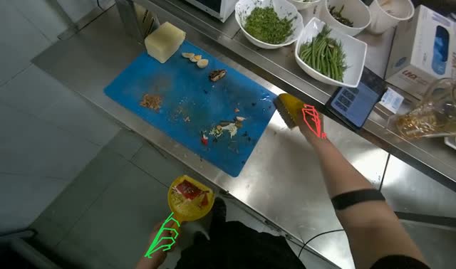 Sweeping food scraps from counter: egocentric robotics sample