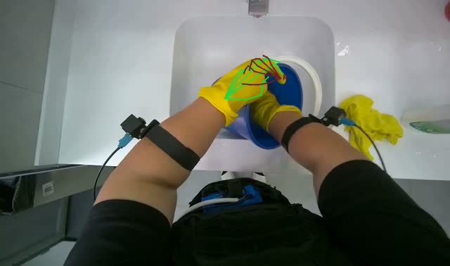 Cleaning blue bucket: egocentric robotics sample