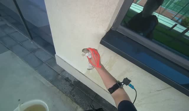 Cleaning wall next to window: egocentric robotics sample
