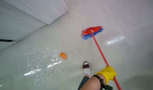Scrubbing floor with brush: egocentric robotics sample
