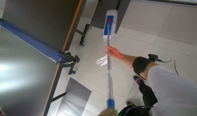 Mopping floor with flat mop: egocentric robotics sample