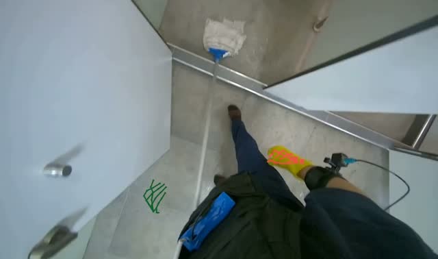 Mopping restroom floor: egocentric robotics sample