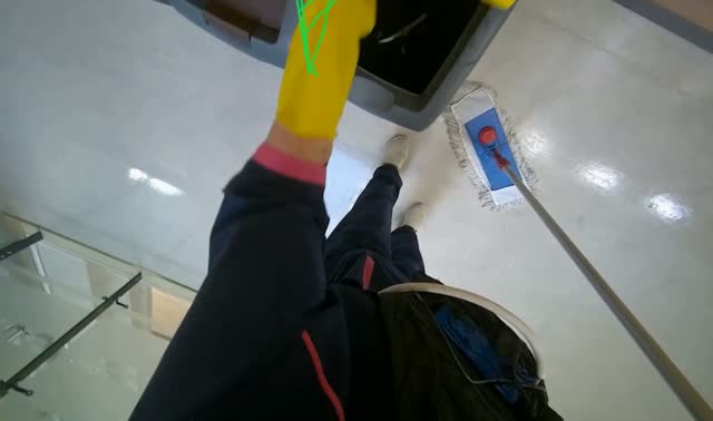 Mopping floor with flat mop: egocentric robotics sample