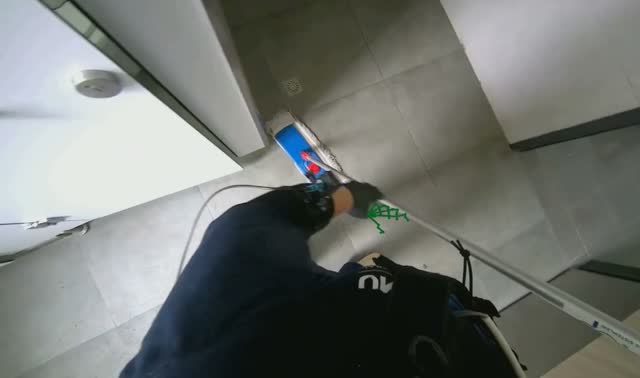 Mopping bathroom floor: egocentric robotics sample
