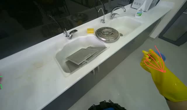 Cleaning pot lid in sink: egocentric robotics sample