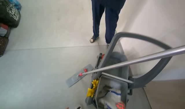 Preparing mop for cleaning: egocentric robotics sample
