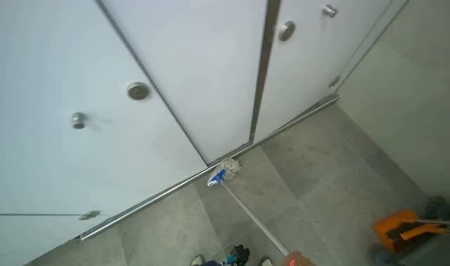 Mopping restroom floor: egocentric robotics sample