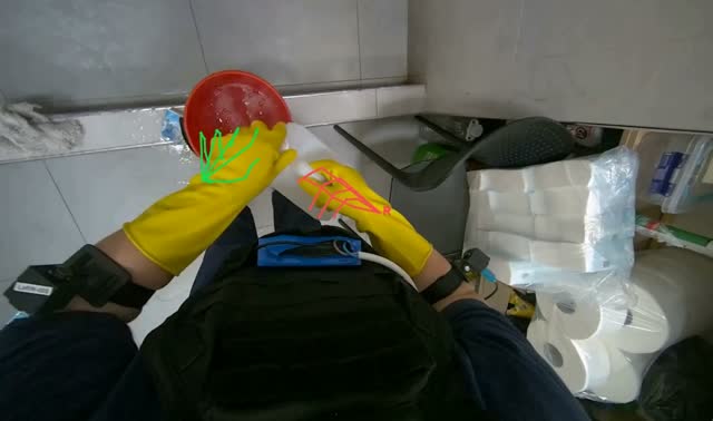 Adding cleaning solution and wiping sinks: egocentric robotics sample