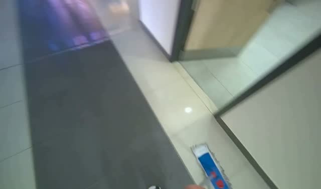 Mopping tiled hallway floor: egocentric robotics sample