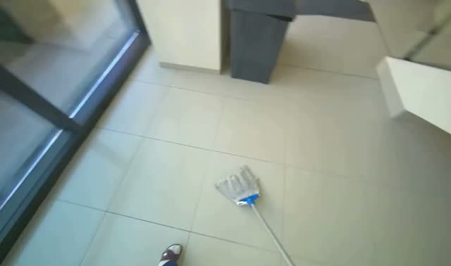 Mopping tiled floor: egocentric robotics sample