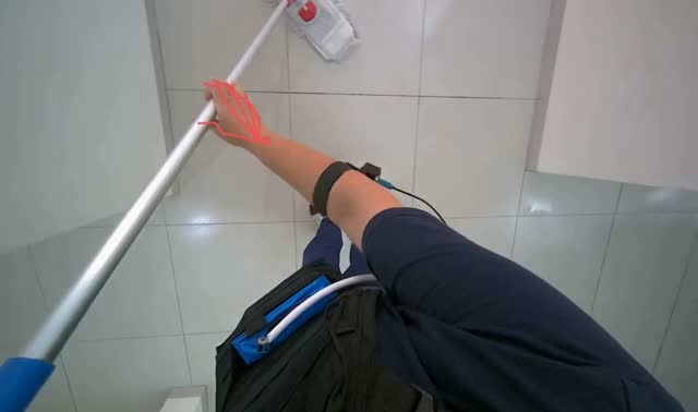 Mopping floor with flat mop: egocentric robotics sample