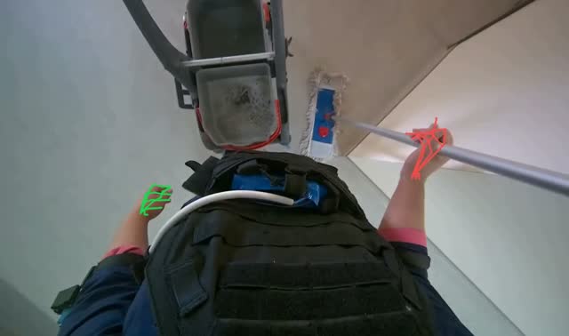 Wringing mop in bucket: egocentric robotics sample
