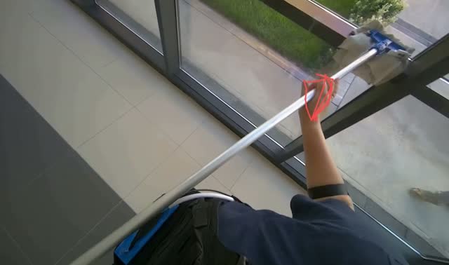 Cleaning glass windows with mop: egocentric robotics sample