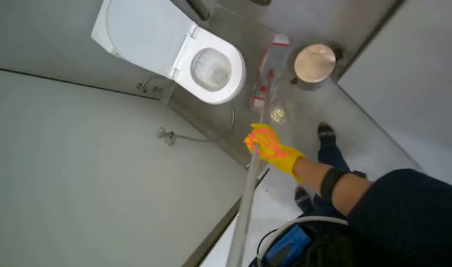 Mopping bathroom floor: egocentric robotics sample