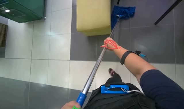 Mopping floor with blue mop: egocentric robotics sample