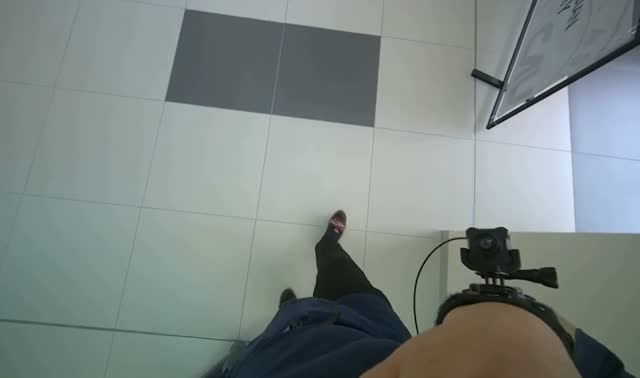 Mopping tiled floor with flat mop: egocentric robotics sample