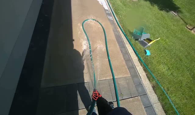 Spraying water on sidewalk: egocentric robotics sample