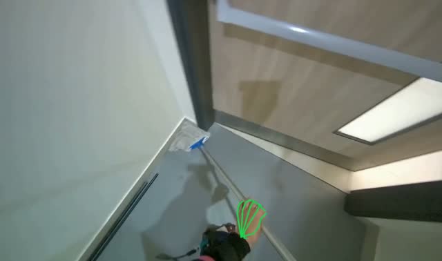 Mopping grey sports hall floor: egocentric robotics sample