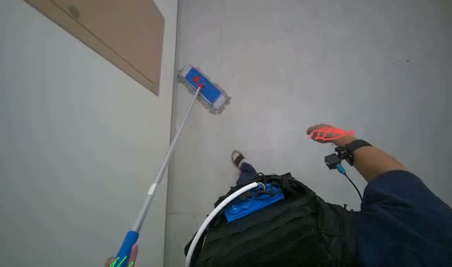 Mopping floor with flat mop: egocentric robotics sample