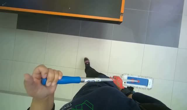 Wet mopping office floor: egocentric robotics sample
