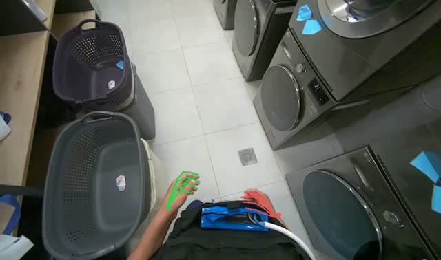 Loading clothes and adding detergent to washing machine: egocentric robotics sample