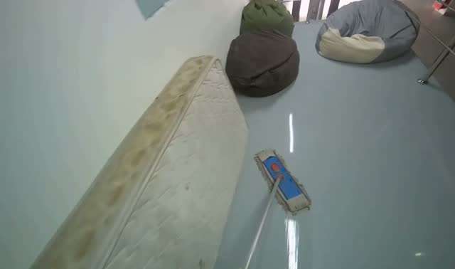 Mopping hallway floor: egocentric robotics sample