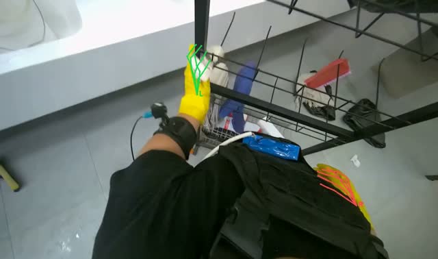 Wiping metal rack: egocentric robotics sample