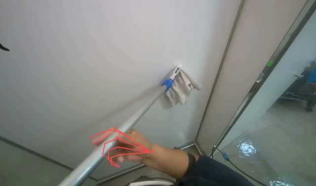Cleaning shower walls with mop: egocentric robotics sample