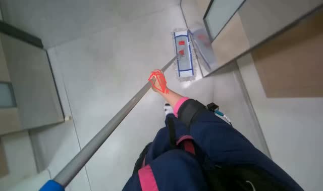 Mopping hallway floor: egocentric robotics sample