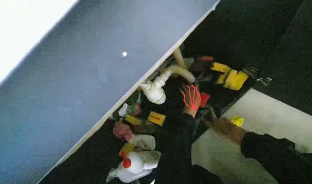 Unloading items from under sink cabinet: egocentric robotics sample