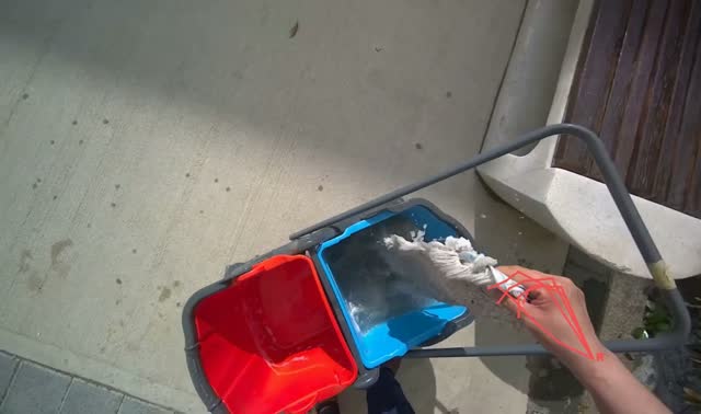 Emptying and preparing mop buckets: egocentric robotics sample