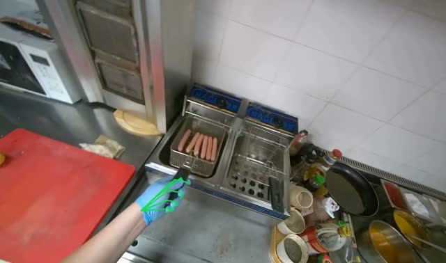Placing sausages in oil for cooking: egocentric robotics sample