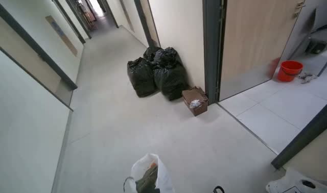 Transferring laundry to basket: egocentric robotics sample