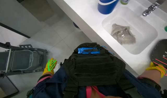Preparing mop and bucket for cleaning: egocentric robotics sample