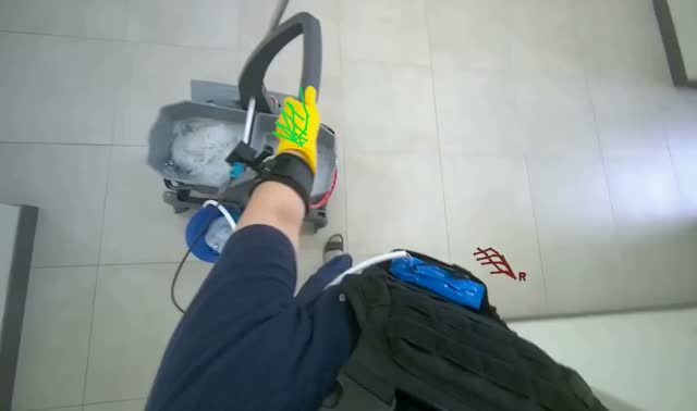 Preparing mop for cleaning: egocentric robotics sample