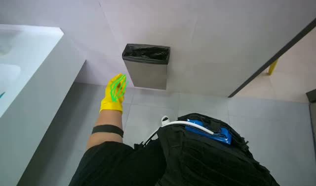 Spraying cleaner on bathroom sinks and counter: egocentric robotics sample