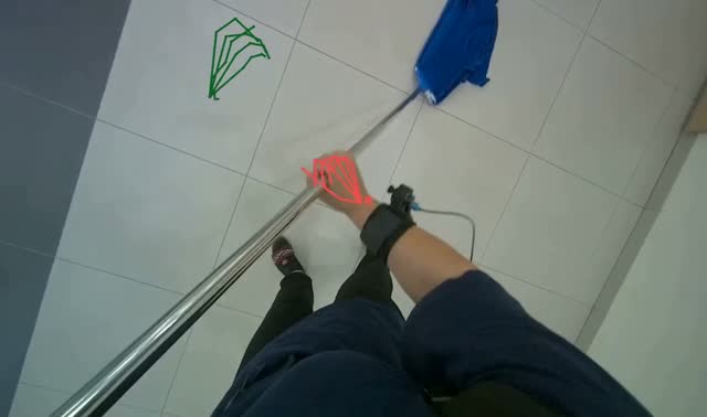 Mopping tiled floor with flat mop: egocentric robotics sample