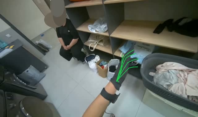 Placing plastic laundry bag in front of washing machine: egocentric robotics sample