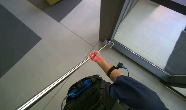 Wiping glass doors with pole: egocentric robotics sample