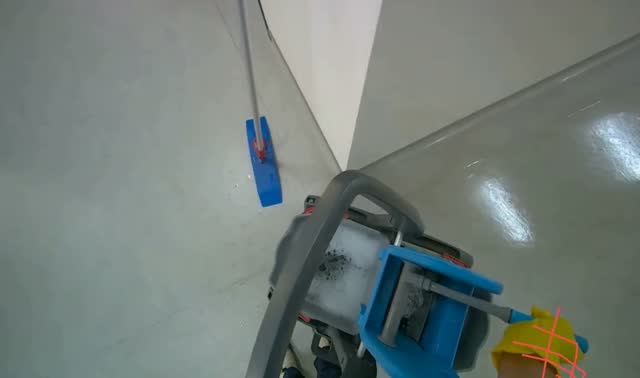 Preparing mop for cleaning: egocentric robotics sample