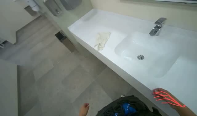 Applying solution and wiping bathroom countertop: egocentric robotics sample