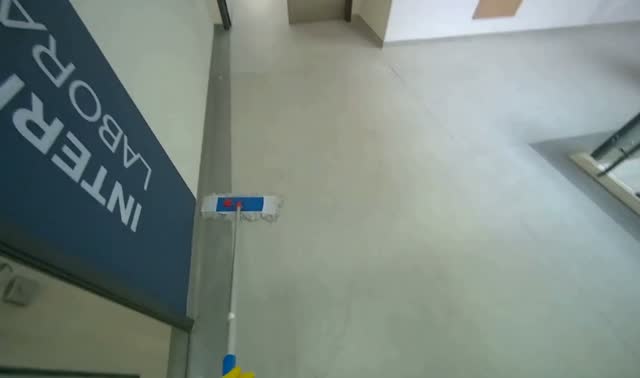 Mopping hallway floor: egocentric robotics sample