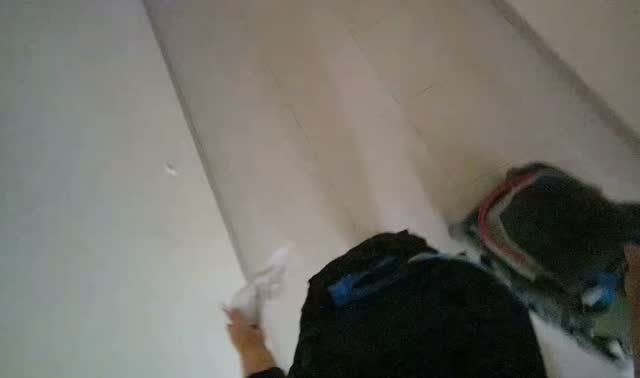Pushing mop bucket through hallway: egocentric robotics sample