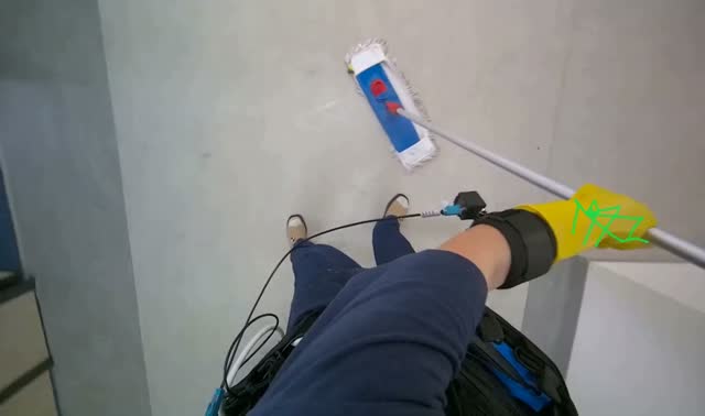 Mopping lobby floor: egocentric robotics sample
